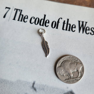 The Feather Charm