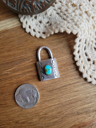 The Maya Lock Pendants