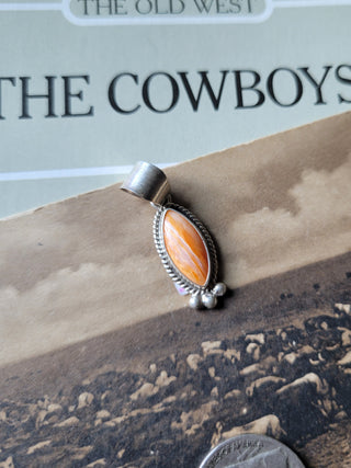 The Carlisle Pendant - Orange Spiny
